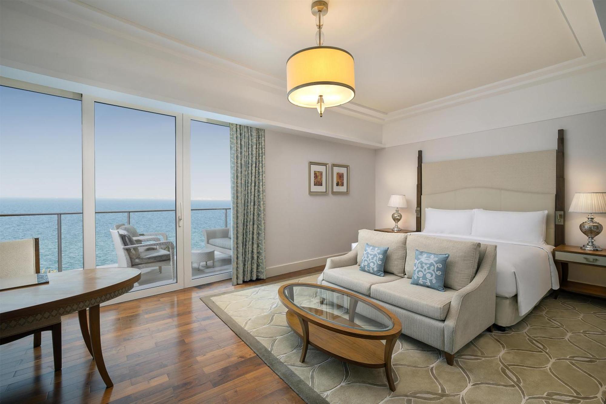 Habitación Deluxe con vistas al perfil urbano y al mar - Cama extragrande